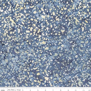 May include: Blue fabric with a speckled pattern. The fabric has a dark blue background with irregular, light beige shapes scattered across the surface. The pattern is reminiscent of pebbles or small stones. The fabric is measured in inches.
