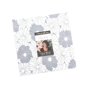May include: A white fabric with a gray floral pattern. The fabric is labeled "Moda Color Crush" and "V and Co."