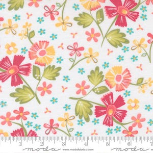 May include: White fabric with a floral pattern featuring red, yellow, and pink flowers, green leaves, and small blue flowers. The fabric has a ruler along the bottom with the word "moda" printed on it.