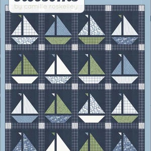 May include: A quilt pattern featuring a repeating sailboat design. Each sailboat has a white sail, with blue, green, and patterned accents. The background is a dark blue plaid. The text "thimble blossoms" and "SAIL" are visible.
