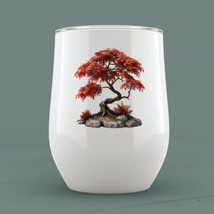 Puede incluir: Un vaso blanco de acero inoxidable con un diseño de árbol bonsái rojo y marrón.