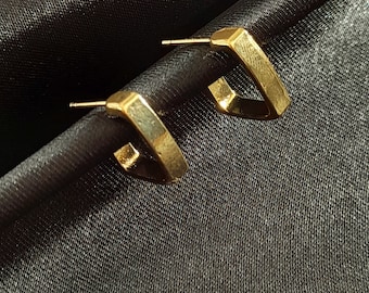 Fyrkantiga retroörhängen, Statementsmycken, Vintageinspirerade örhängen, Unik retrodesign, Djärv retrostil,