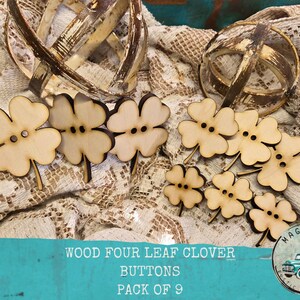 May include: Nine wooden four-leaf clover buttons with dark brown edges and two button holes. The buttons are light brown and have a natural wood grain. The text on the image reads "Wood Four Leaf Clover Buttons Pack of 9".