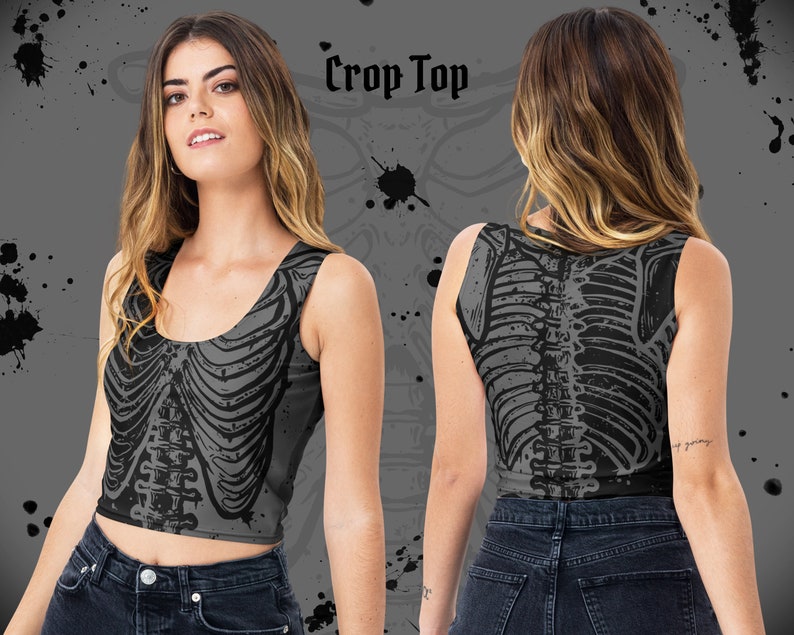 K&ouml;nnte beinhalten: Graues Crop-Top mit schwarzem Brustkorb-Design auf Vorder- und R&uuml;ckseite. Die Worte "Crop Top" sind oben im Bild aufgedruckt. Das Top ist &auml;rmellos und hat einen Rundhalsausschnitt.