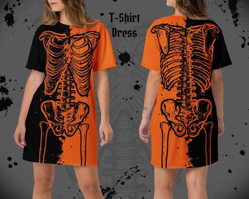 May include: Orange and black T-shirt dress with a skeleton graphic print. The dress has short sleeves and a relaxed fit.
