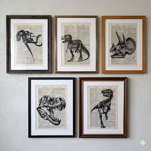 May include: Five framed wall art prints featuring black ink illustrations of dinosaur skeletons printed over vintage dictionary pages. The collection includes a T-Rex, a Triceratops, and other prehistoric fossils, each set in a wooden frame.