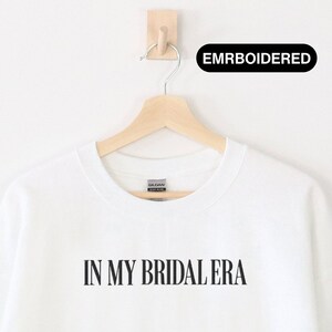 In My Bridal Era Embroidered Unisex Sweatshirt