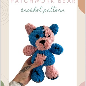 May include: A handmade patchwork bear crochet pattern. The bear is blue and pink, with a stitched design. The text "PATCHWORK BEAR crochet pattern" is at the top of the image.