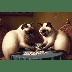 May include: Two Siamese cats playing cards at a table with a blue tablecloth. The cats are both looking intently at the cards, and one of them is holding a card in its paw.