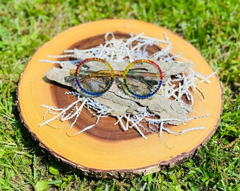 Gafas de sol con círculo de cristal y arcoíris