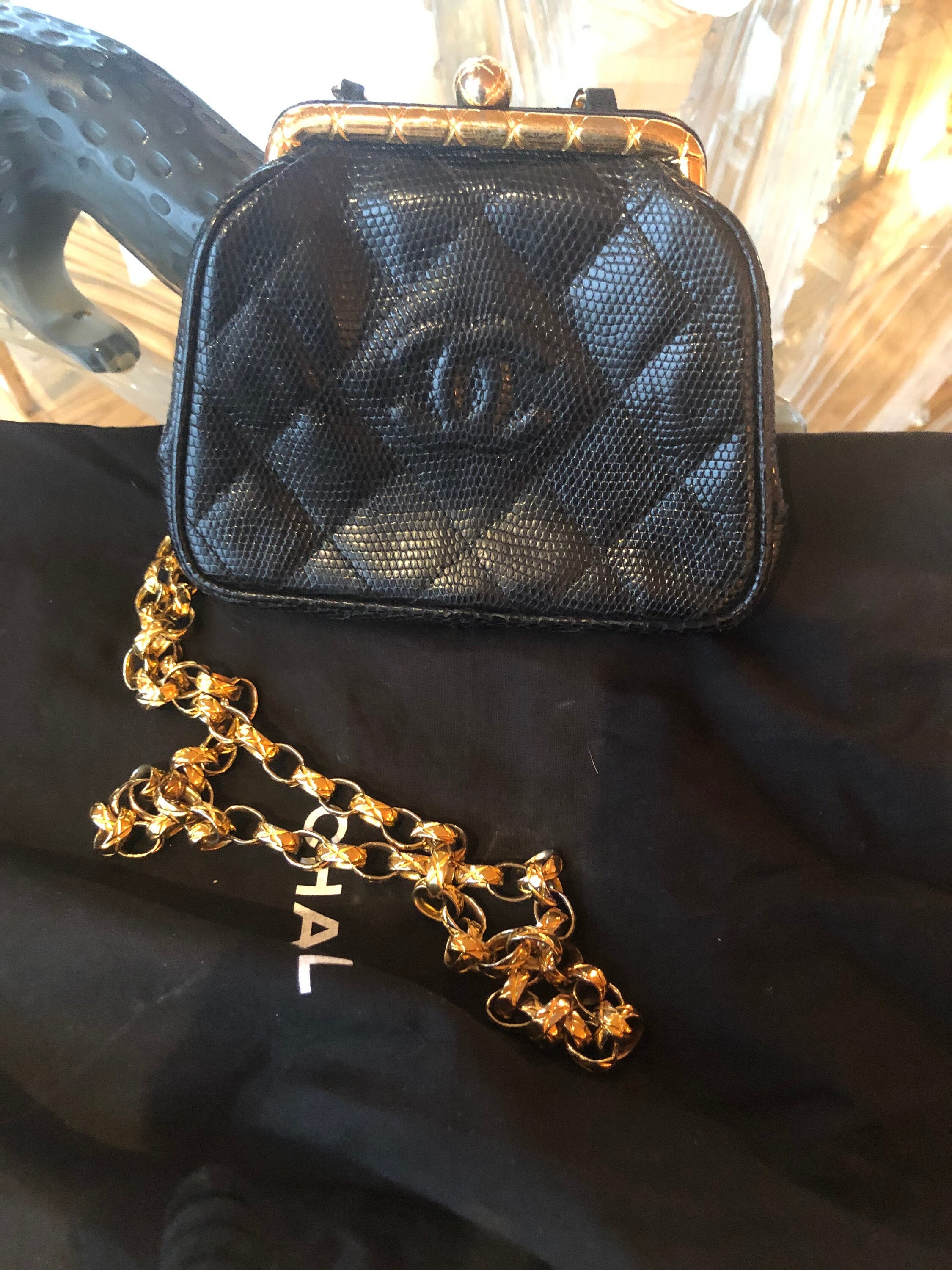 Sold at Auction: Rare Vintage Chanel Black Lizard Mini Flap Bag