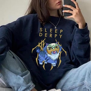 Sleepderrpy Cute Cat Retro Anime Rock Parody Graphic Tee, Funny Music Character Shirt, Vintage Style T-Shirt Hoodie Sweatshirt Gift for Fans