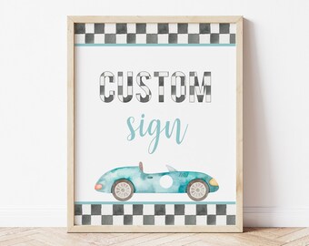 May include: A printable sign with a blue car and a checkered background. The sign says "CUSTOM sign".
