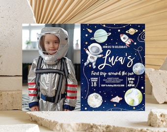 May include: A blue and white space-themed birthday invitation with a photo of a child dressed as an astronaut. The invitation says "Join us to celebrate Luca's First trip around the sun" with the date and time of the party.