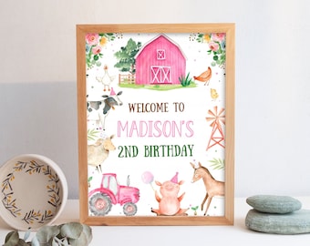 May include: A pink and white welcome sign with a red barn, farm animals, and the text "Welcome to Madison's 2nd Birthday".