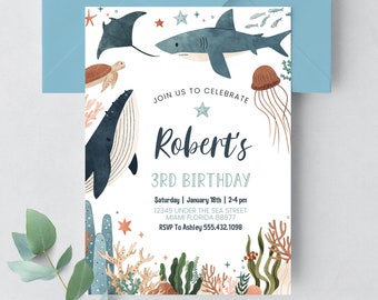 May include: A blue and white invitation card with a watercolor illustration of a whale, shark, stingray, turtle, and jellyfish. The text on the card reads "Join us to celebrate Robert's 3rd Birthday. Saturday January 18th | 2-4 pm 12345 Under the Sea Street Miami Florida 88877 RSVP To Ashley 555.432.1098 https://www.etsy.com/shop/Crishstudio"