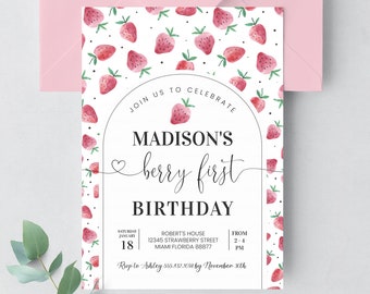 May include: A white invitation with a pink and green watercolor strawberry pattern. The text reads "Join us to celebrate Madison's berry first birthday". The invitation includes details for the event, including the date, time, location, and RSVP information.