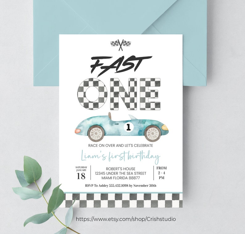 May include: A blue and white race car themed first birthday invitation with a watercolor illustration of a blue race car with a checkered flag pattern. The invitation says "Fast One" and includes the text "Race on over and let's celebrate Liam's first birthday".