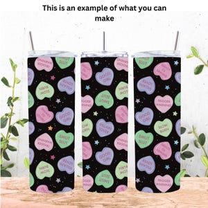 May include: Three stainless steel tumblers with a black background and a repeating pattern of colorful candy hearts with various phrases printed on them. The phrases include "Good Girl", "Slow Burn", "Trigger Warning", "Slut", "Smut", "Enemies to Lovers", "Villain Lover".