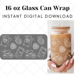 May include: A digital download for a 16 oz glass can wrap featuring a white design of a Tamagotchi, a Game Boy, and a Super Nintendo controller on a grey background.  The design is also shown on a glass can with a brown beverage inside.