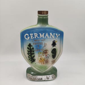 Vintage 1960 JIM BEAM WHISKEY BOTTLE ELEPHANT/flower vase