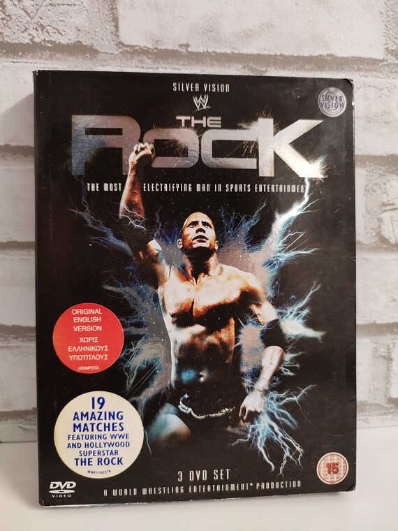 Lot of 4 WWE DVD Sets: Hardy Boys, The Rock, Rey Mysterio