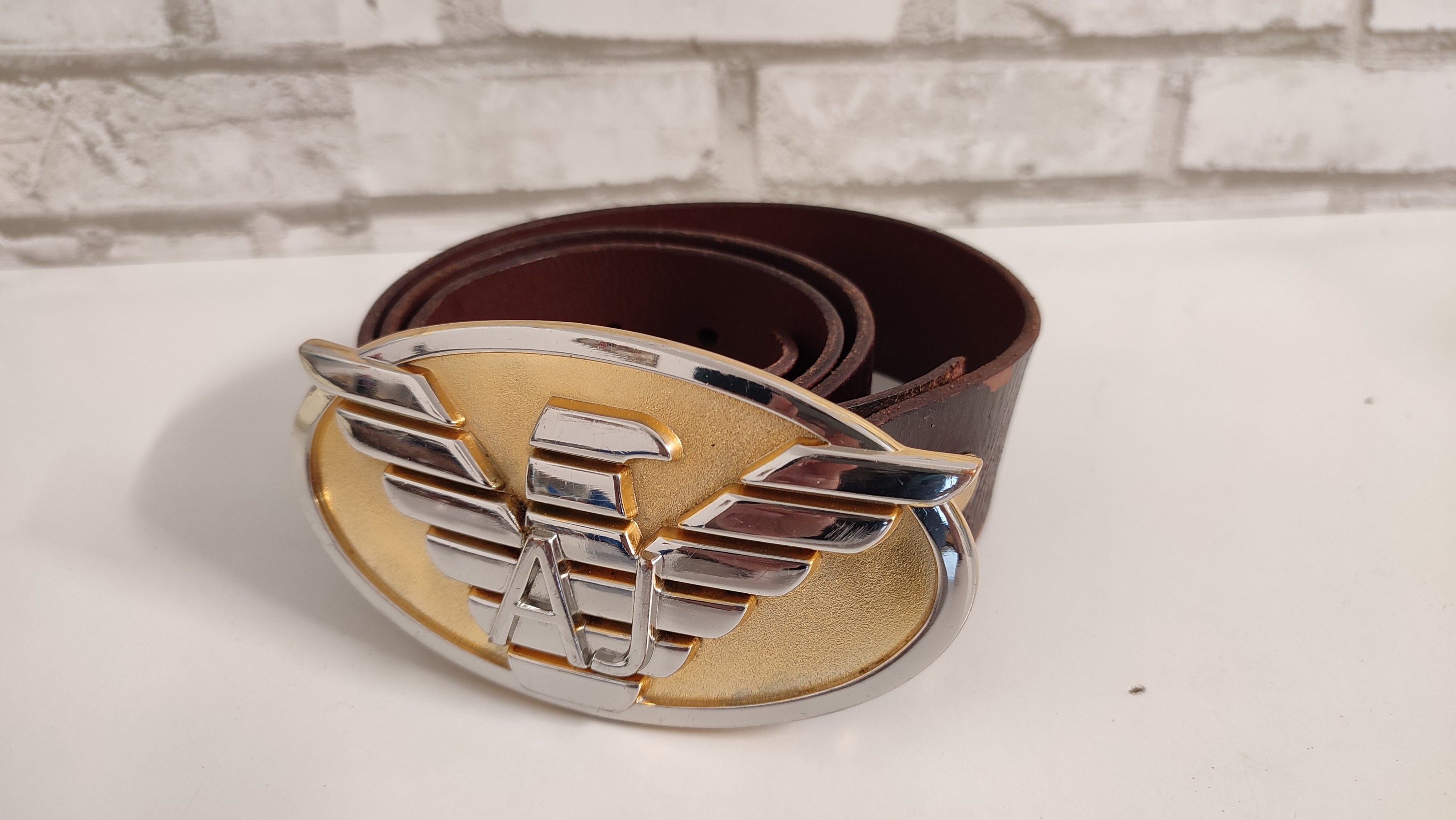 Gold top armani belt