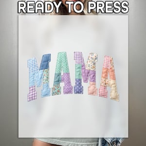 May include: White sublimation transfer with the word "MAMA" in patchwork letters. The letters are made of various patterned fabrics, including gingham, floral, and polka dots. The text "READY TO PRESS" is at the top.