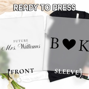 May include: Two heat transfer designs labeled READY TO PRESS. The left design features the black text FUTURE Mrs. Williams, marked FRONT. The right design features the black letters B and K separated by a heart symbol, marked SLEEVE.