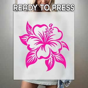 May include: A large, vibrant pink hibiscus flower design on a white background. The words "READY TO PRESS" are at the top. The floral design is a bold, graphic representation of the tropical flower.