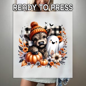 May include: A digital illustration featuring a Highland cow wearing an orange knit hat, a friendly ghost, and pumpkins. The design includes a black and white plaid background, flowers, and the text "READY TO PRESS" at the top. The image has a Halloween theme.