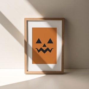 Minimalistisch pompoengezicht | Jack-O-Lantern kunst aan de muur | Spookachtig decor | Moderne Halloween-print | Herfstdecor | Pompoenafdruk | Directe download