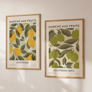Peut inclure: Deux impressions encadrées avec une illustration botanique de citrons et de limes. Les impressions sont intitulées "Marché aux Fruits" et présentent le texte "Les Citrons" et "Les Citrons Verts".
