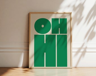 May include: A framed print with the word "OH HI" in bold, green letters on a white background.