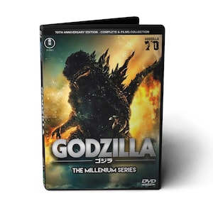 Peut inclure: Un boîtier DVD pour Godzilla : The Millennium Series. La couverture présente un Godzilla vert foncé menaçant sur un fond enflammé. Le texte argenté "GODZILLA" est bien en évidence, avec des caractères japonais en dessous. Le boîtier est une édition 70e anniversaire.