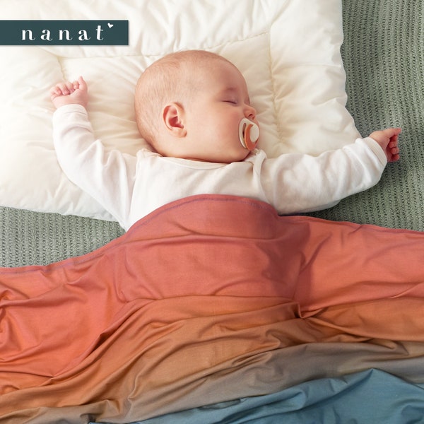 Pima Cotton Sunset baby blanket, swaddle with ombre inspired by the orange and teal green colors of a sunset, ultra-soft with 4-way stretch
