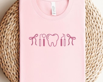 Embroidered Nurse Shirt, Dental Nurse Sweatshirt, Tooth Embroidery Crewneck, Cute Coquette Bow Nurse Gift, Dentist Hygienist T-Shirt