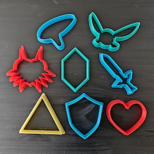 Legendary Hero Themed cookie cutters - Majora Mask, Sword, Shield, Triforce shard, Rupee, Heart, Navi, and Ocarina