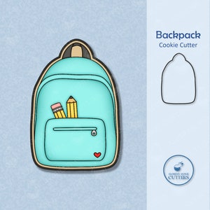 May include: A blue backpack cookie cutter with two yellow pencils in the front pocket. The cutter has a red heart on the front.  Backpack Cookie Cutter.
