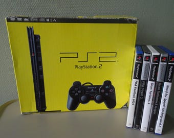 Vintage Game Play Station 2 SLIM with a box + 2 x controller + cables + manuals + 4 games driving + memory card