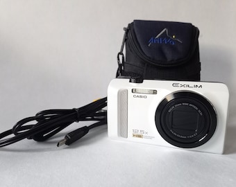 Casio Exilim EX-ZR200 + case + strap + 16gb memory card