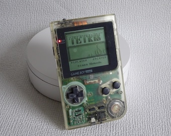 Vintage Game Boy Pocket transparent SET + light + AC Adapter + Piranha Battery pack + 2x games