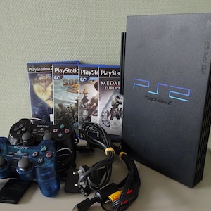 Vintage Game Play Station 2 Fat + adattatore hdd + 2x controller + scheda di memoria + manuali + 4 giochi sparatutto + cavi + disco di accesso alla rete