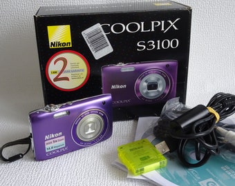 Nikon COOLPIX S3100 + box + cd's + tv cable + pc charging cable + 2x battery + strap, color purple, perfect condition