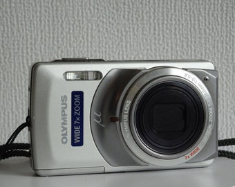 Olympus U-7010 + strap + usb cable + 2 x battery + 2 x sd card