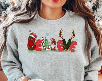 Sudadera navideña Believe, camiseta navideña Believe, suéter navideño Believe, familia navideña, regalo navideño, ropa navideña, fiesta navideña