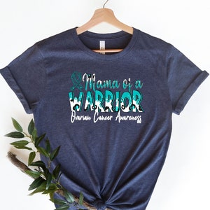 Ovarian Cancer Awareness Shirt, Mama of a Warrior Ovarian Cancer Shirt, Ovarian Cancer Survivor Tee, Ovarian Cancer Gift, Teal Cancer Ribbon