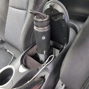 Nissan 370z / Armrest storage & Cup holder