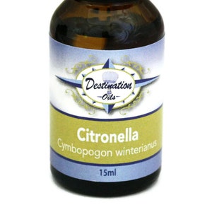 May include: A 15 ml amber glass bottle of Citronella essential oil with a black cap. The label is blue and yellow with the text "Destination Oils" and "Citronella Cymbopogon winterianus".