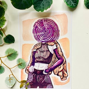 May include: Illustration of a figure with a purple spiral head, wearing a dark top, purple arm warmers, and patterned pants. The figure is set against a peach and white background. The art style is reminiscent of a linocut print.